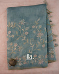 Teal Floral Printed and Embroidered Semi Linen Saree