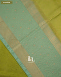 Parrot Green Paisley Brocade Semi Georgette Saree — Border